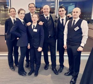Waiting staff and bartenders for a corporate event